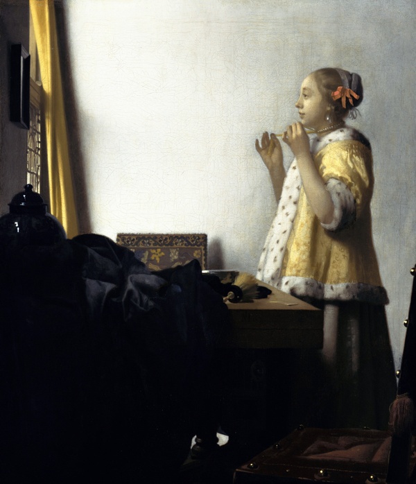 Young Woman with a Water Pitcher - Johannes Vermeer (c. 1662)